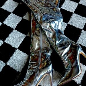 Silver thigh high heeled boots